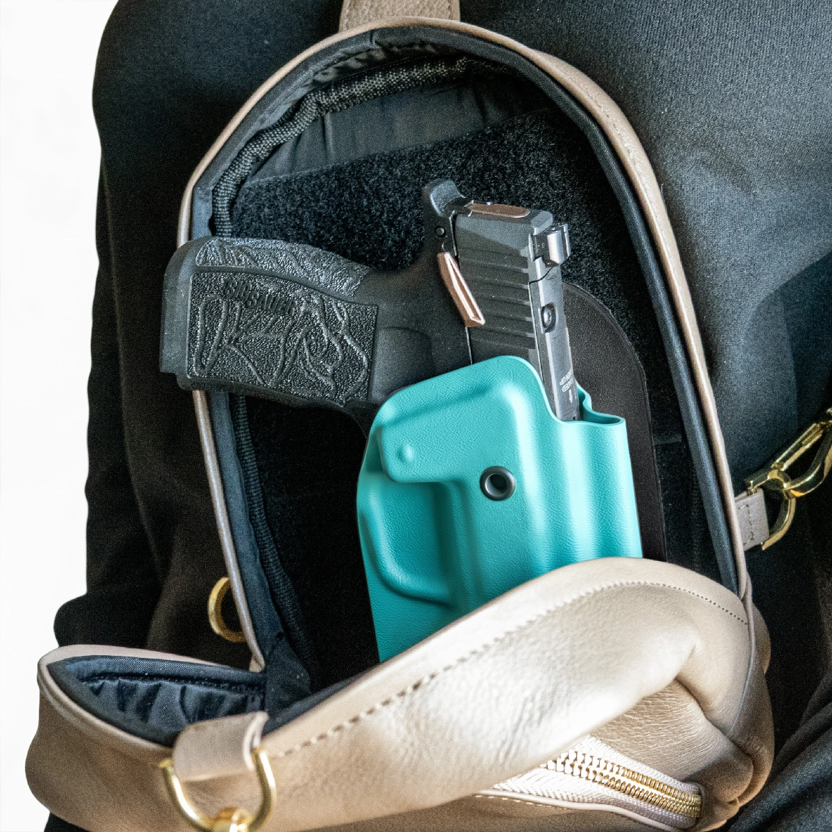 AQUA CAKES CONCEALED HOLSTER IN A CAKES CONCEALED BAG.