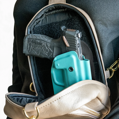 AQUA CAKES CONCEALED HOLSTER IN A CAKES CONCEALED BAG.