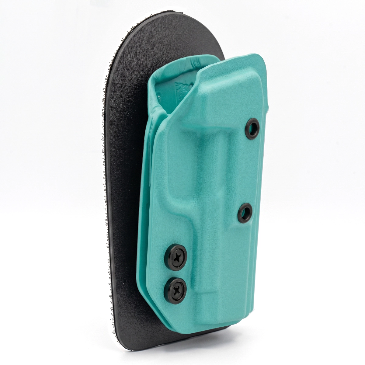 AQUA CAKES CONCEALED CAKES HOLSTER MOUNTED ON A BLACK VELCRO BACKER ANGLED TO THE SIDE. 