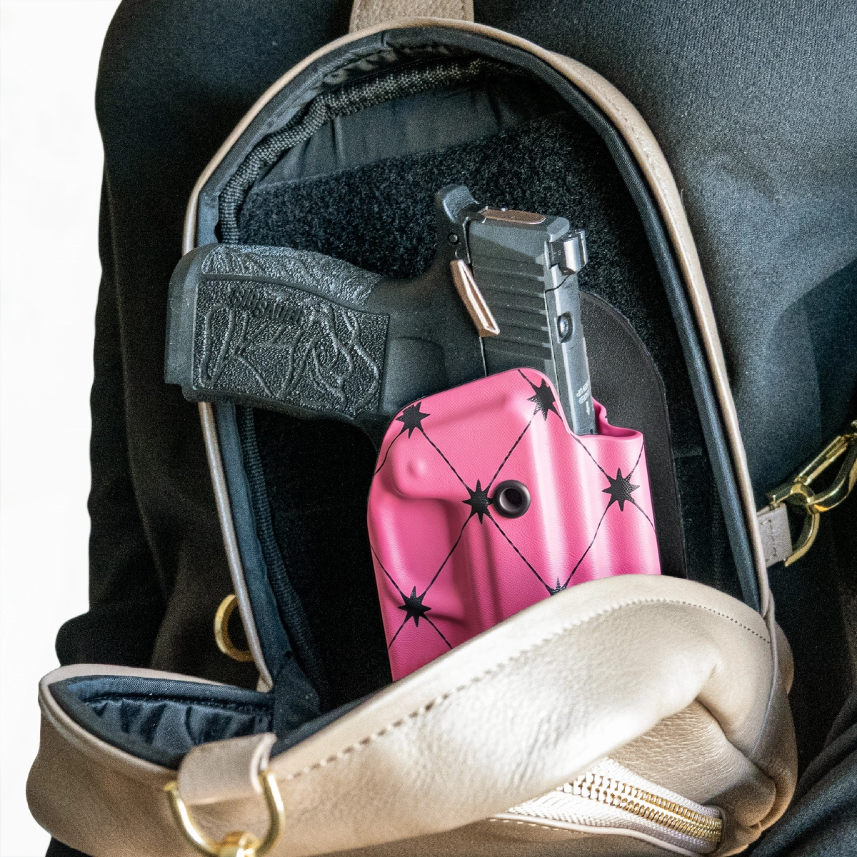 CAKES CONCEALED PRINTED BERRY PINK HOLSTER IN A CAKES CONCEALED BAG.