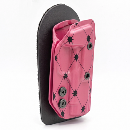 CAKES CONCEALED PRINTED BERRY PINK HOLSTER ON A BLACK VELCRO BACKER SIDE ANGLE. 