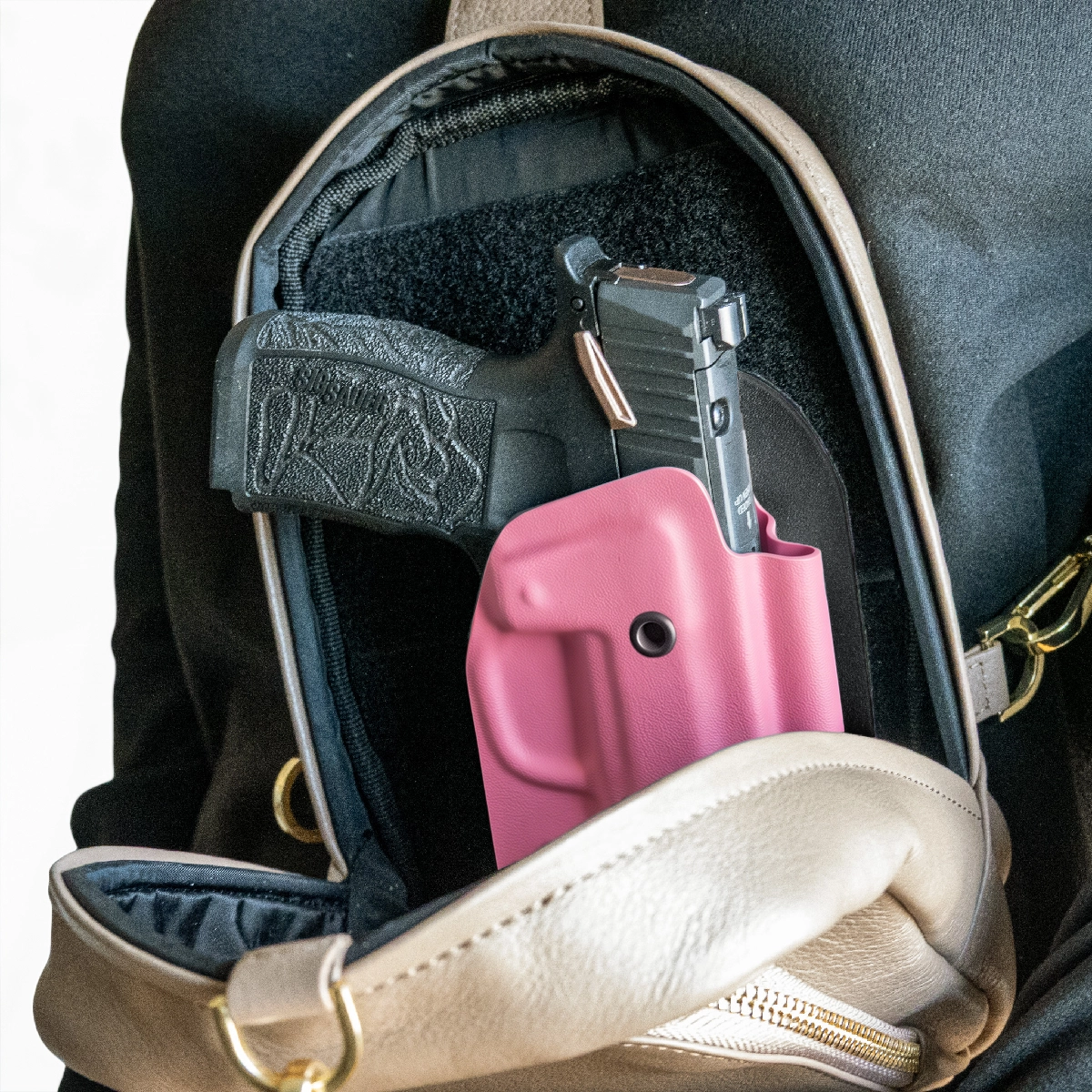 BERRY PINK CAKES CONCEALED HOLSTER IN A CAKES CONCEALED BAG.