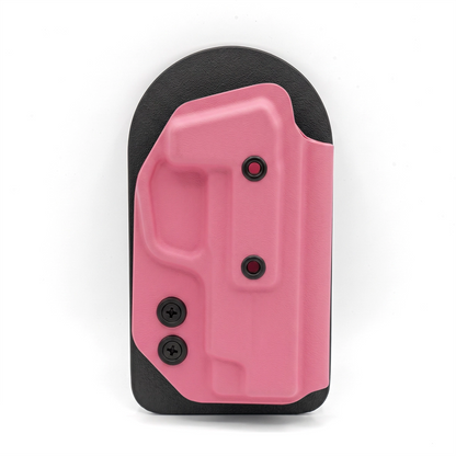 BERRY PINK CAKES CONCEALED HOLSTER ON A BLACK VELCRO BACKER.