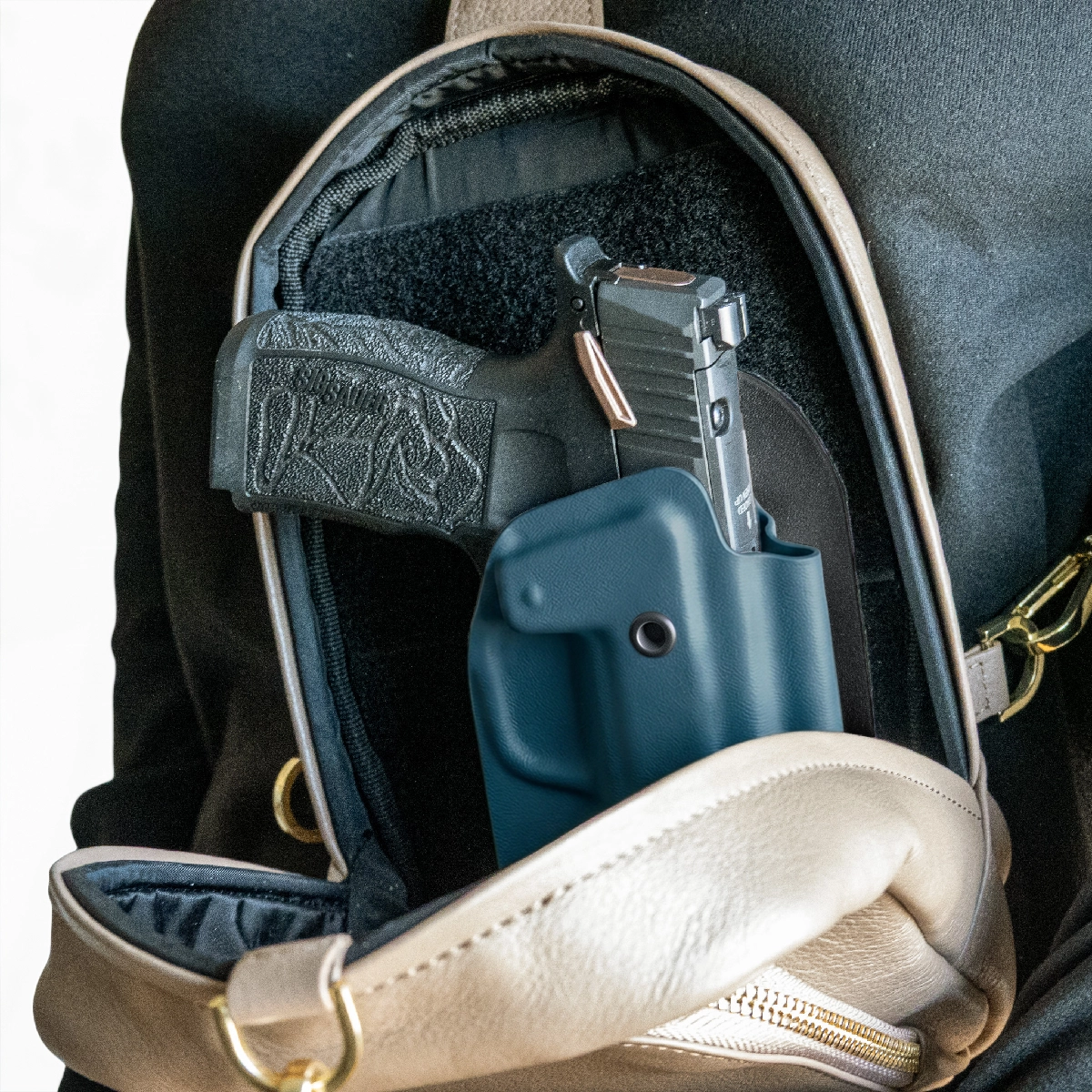 BLUEBERRY CAKES CONCEALED HOLSTER IN A CAKES CONCEALED BAG.
