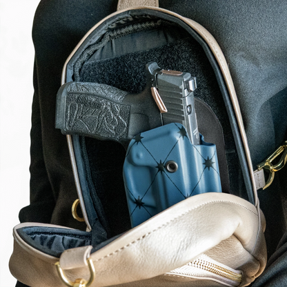 CAKES CONCEALED PRINTED BLUEBERRY HOLSTER IN A CAKES CONCEALED BAG.