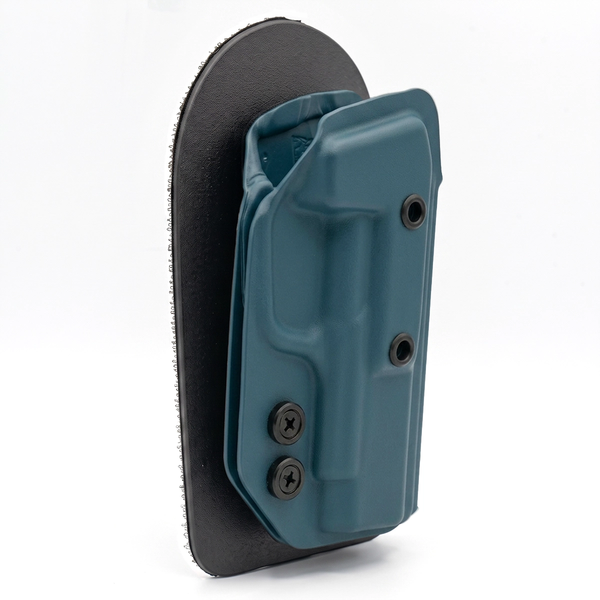 BLUEBERRY CAKES CONCEALED HOLSTER ON A BLACK VELCRO BACKER ANGLED TO THE SIDE. 