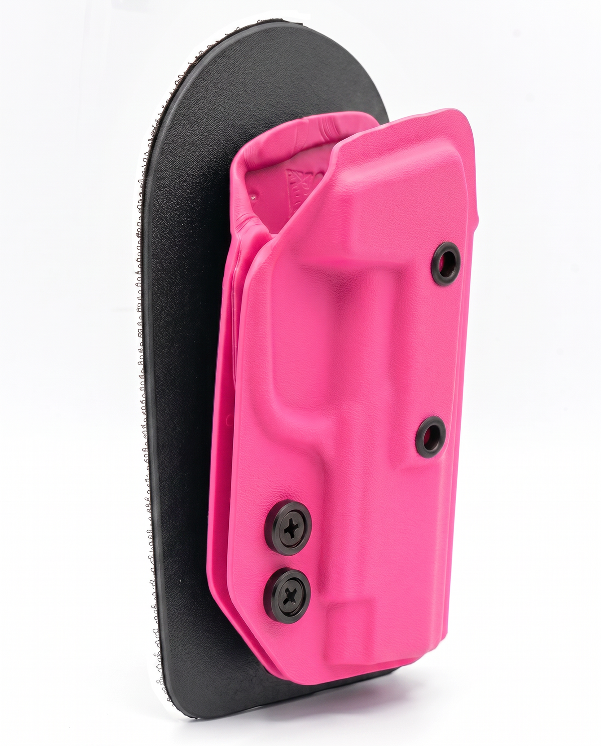 BERRY PINK CAKES CONCEALED HOLSTER ON A BLACK VELCRO BACKER ANGLED TO THE SIDE. 
