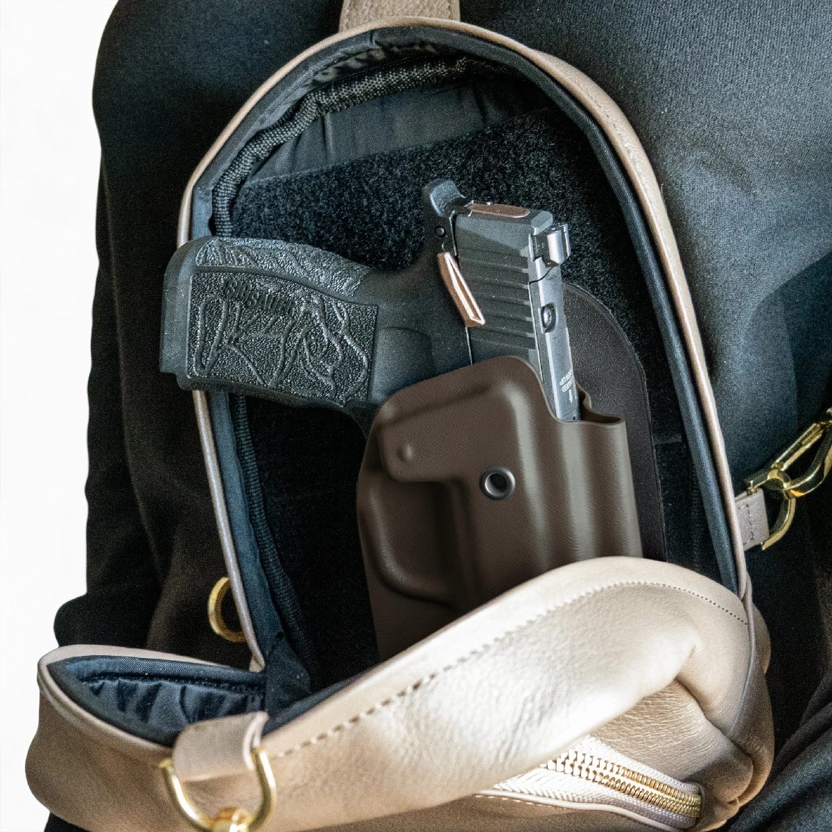 CHOCOLATE CAKES CONCEALED HOLSTER IN A CAKES CONCEALED BAG.