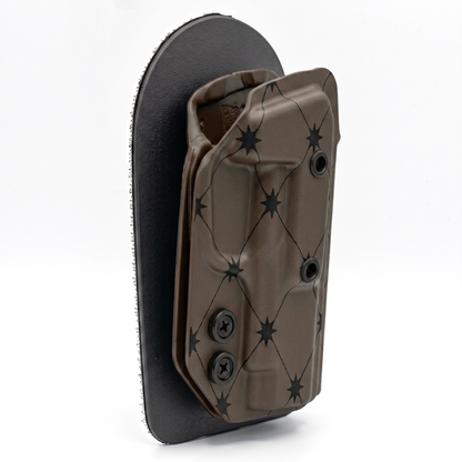 CAKES CONCEALED PRINTED CHOCOLATE HOLSTER ON A BLACK VELCRO BACKER SIDE ANGLE.