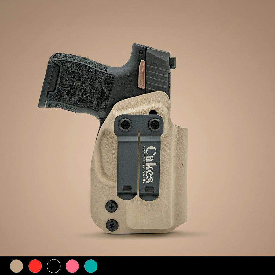 Pistol holster with gun on a beige background