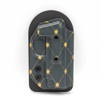 CAKES CONCEALED GOLD PREMIUM HOLSTER ON A BLACK VELCRO BACKER.