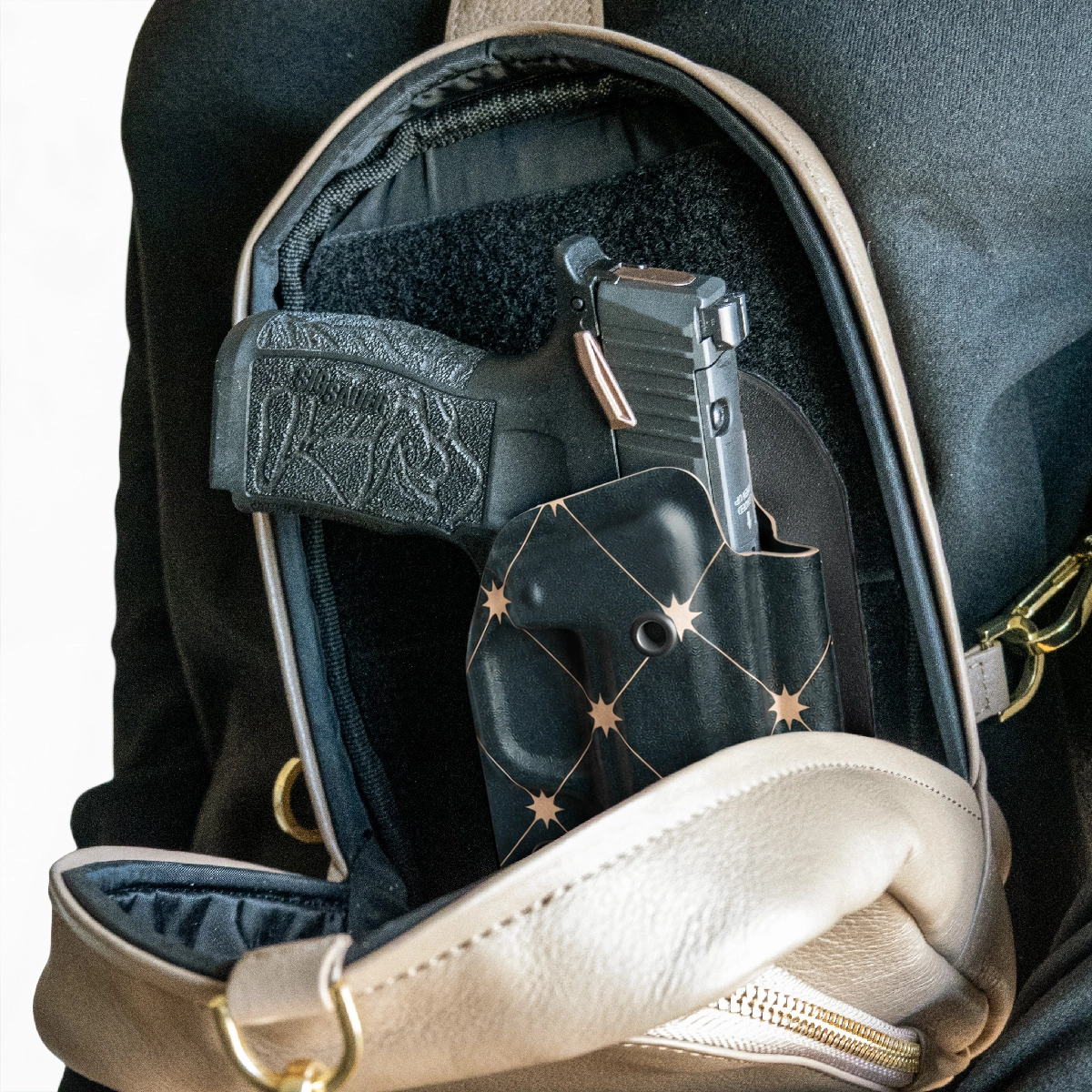 CAKES CONCEALED ROSE GOLD PREMIUM HOLSTER INSIDE A CAKES CONCEALED BAG.