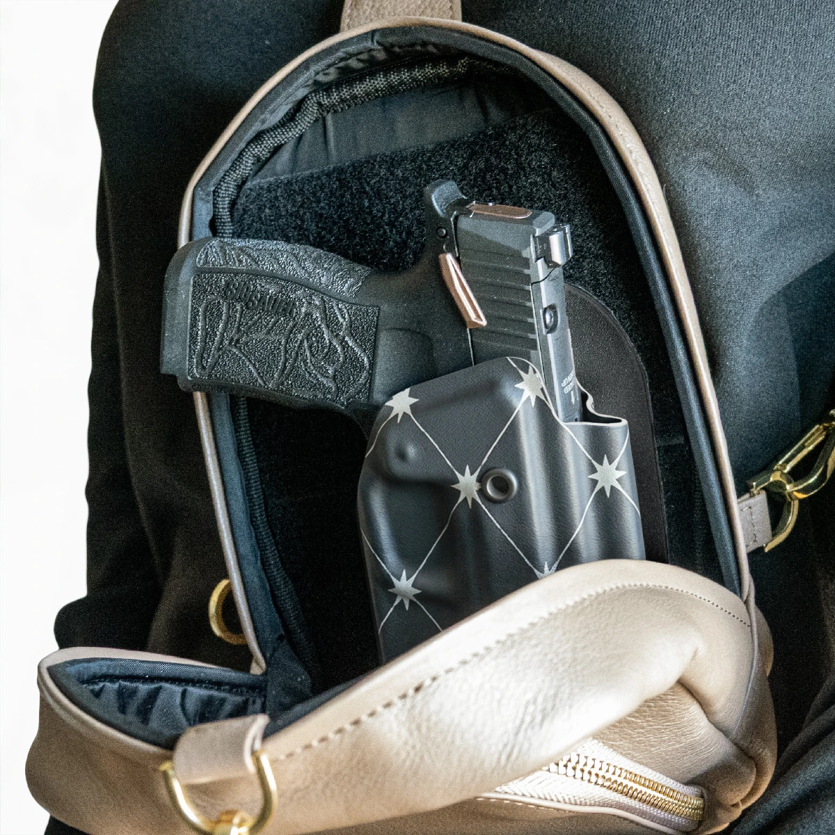 CAKES CONCEALED SILVER PREMIUM HOLSTER INSIDE A CAKES CONCEALED BAG.