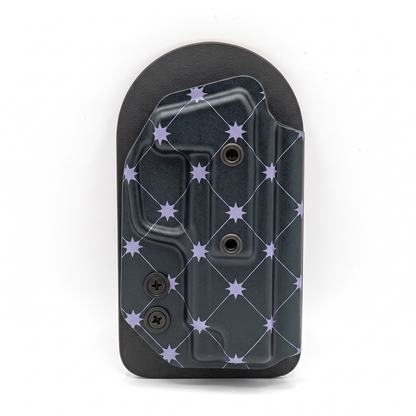CAKES CONCEALED TARO PREMIUM HOLSTER ON A BLACK VELCRO BACKER.