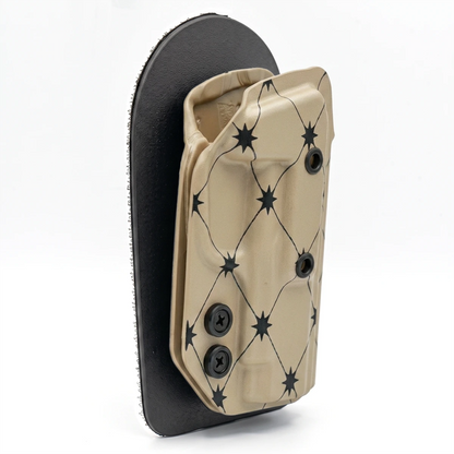 CAKES CONCEALED PRINTED VANILLA HOLSTER ON A BLACK VELCRO BACKER SIDE ANGLE.